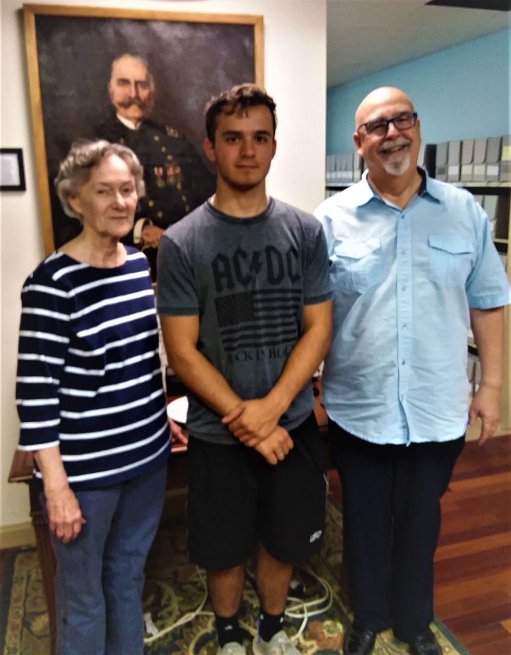Curator, Mary Frazier stands with Intern, Maximilian Wagner and Supervisory Director, Robert Harris